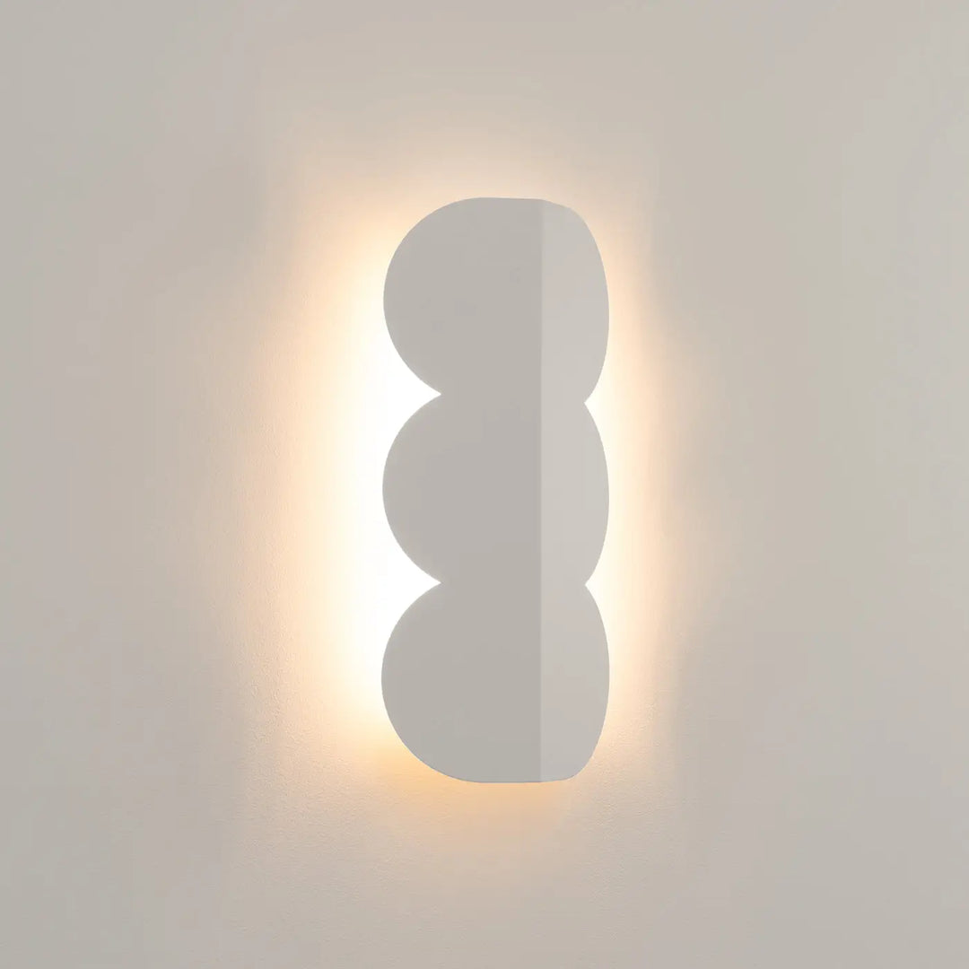 Applique murale BISCUIT beige allumée, halo sur le mur