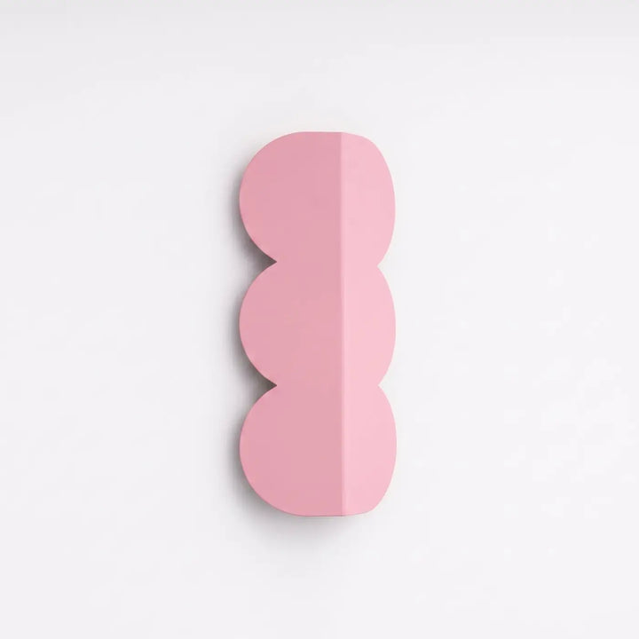 Applique murale BISCUIT rose éteinte, posée au mur