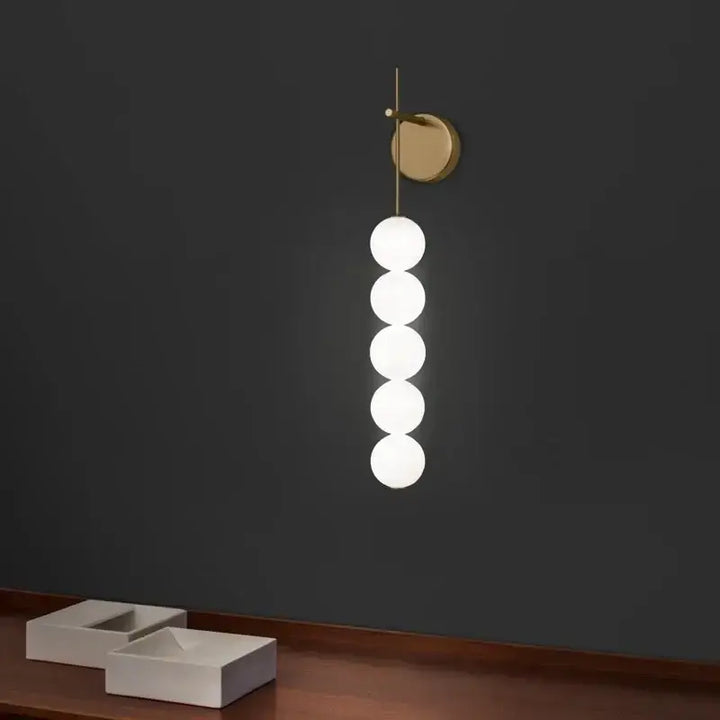 Applique murale originale dorée avec effet solaire doux