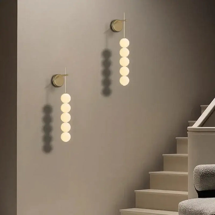 Applique murale originale dorée avec effet solaire doux