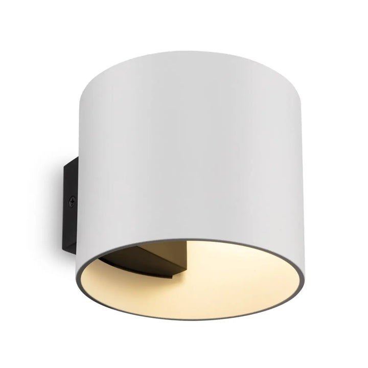 Applique murale rond blanche cylindrique en verre avec finition mate et lumière douce intérieure chaude