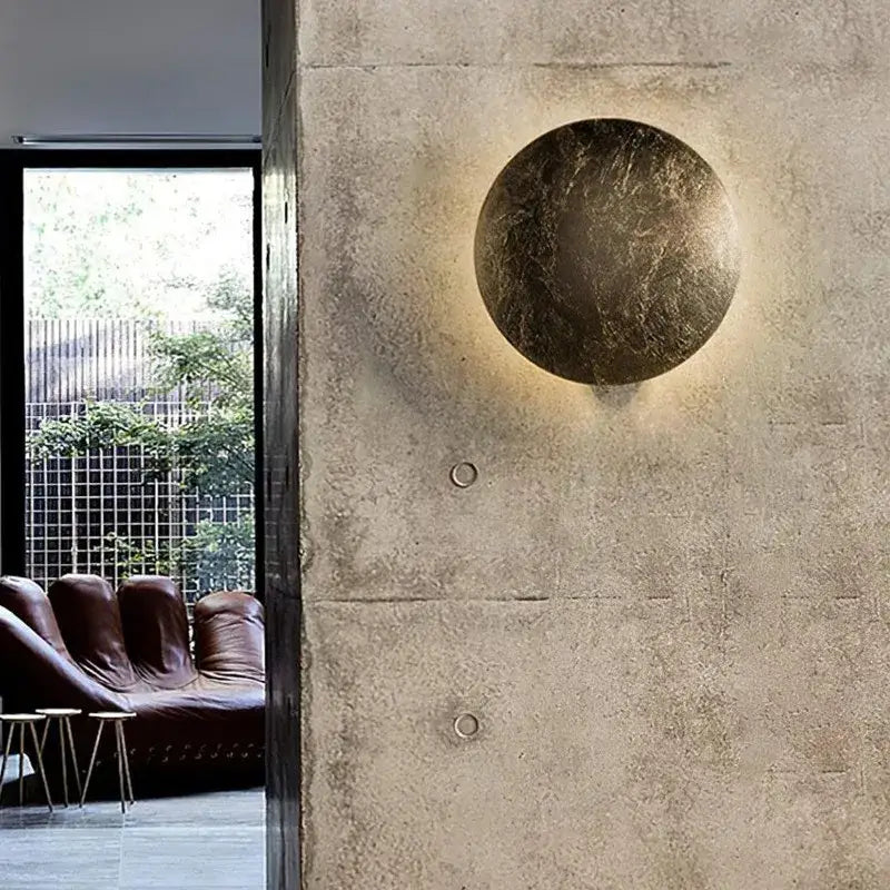 Applique murale ronde LED dorée design effet lune