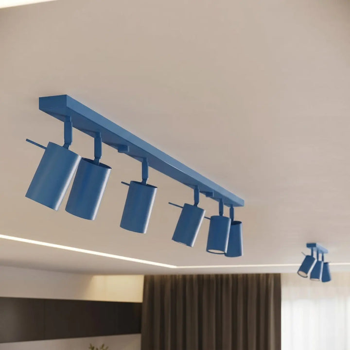 Applique murale bleu clair allumée, vue rapprochée