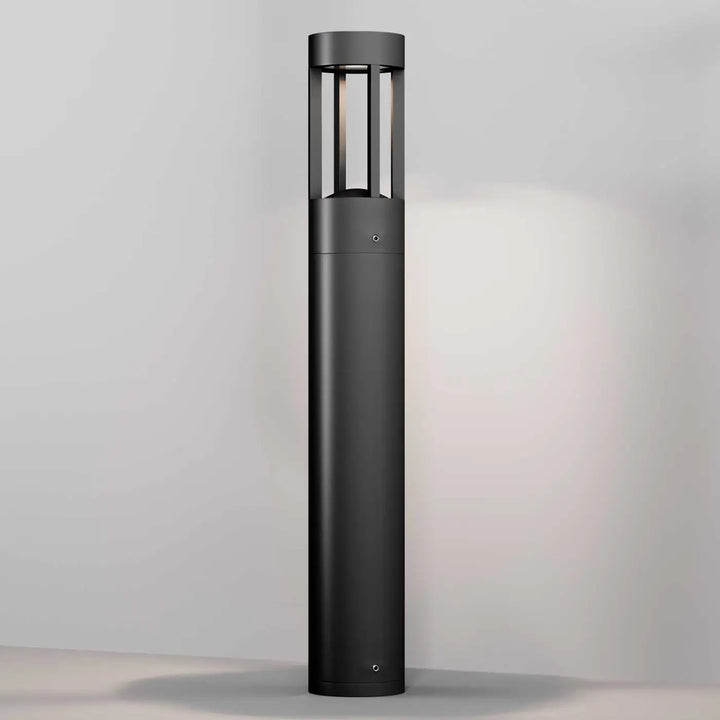 Borne extérieure led noire cylindrique avec indice ip65 et lumière douce pour éclairage de chemin moderne