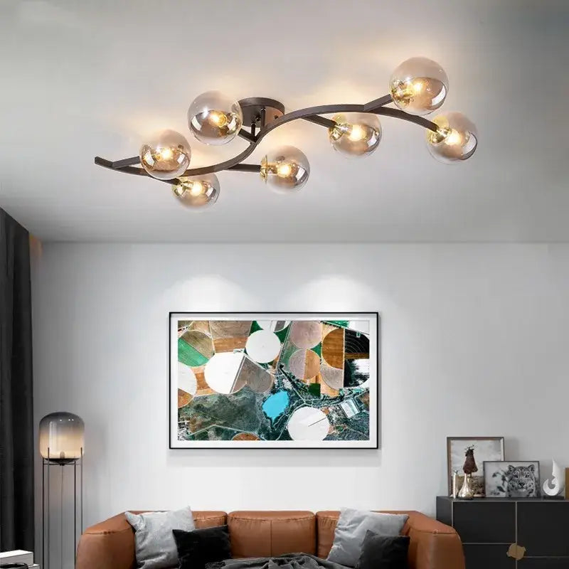 Luminaire plafonnier métal doré avec boules en verre moderne