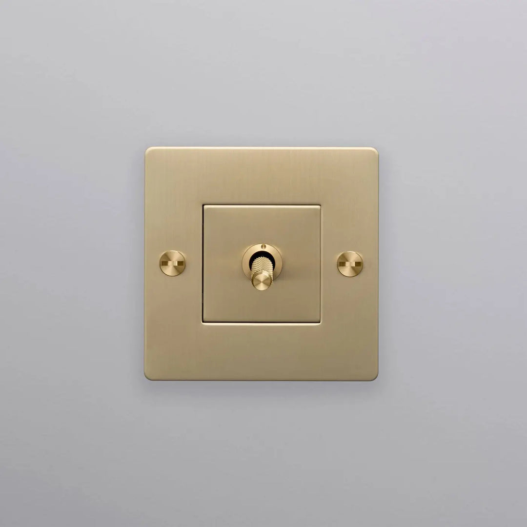 Interrupteur à levier Toggle à gravure quadrillée sans logo doré, finition laiton #couleur_dor