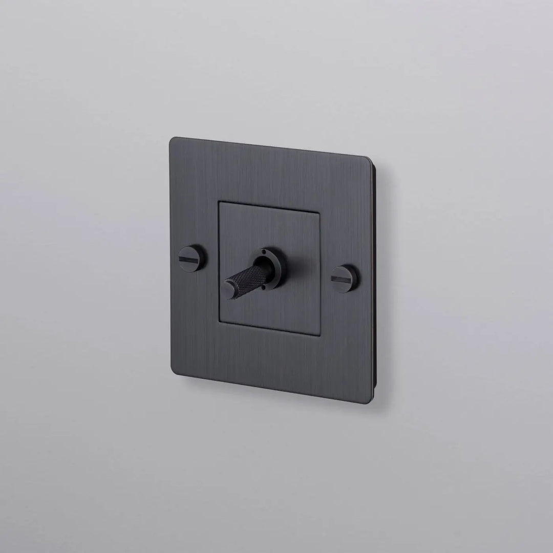 Interrupteur à levier Toggle à gravure quadrillée sans logo bronze fumé #couleur_gris