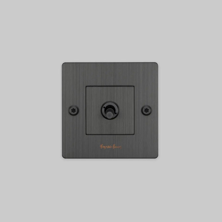 Interrupteur à levier Toggle à gravure alignée avec logo bronze fumé #couleur_gris