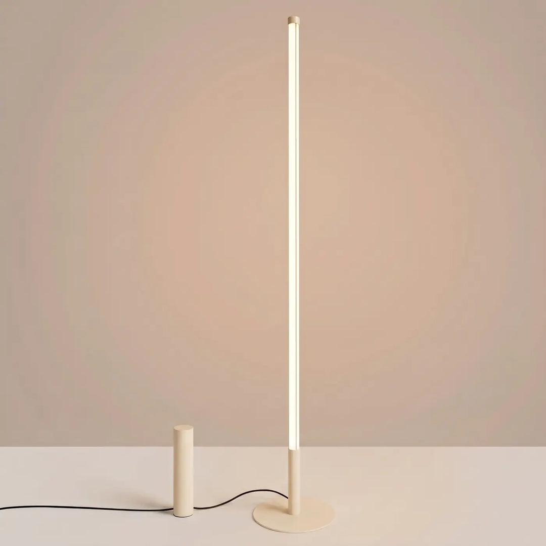 Lampadaire TRANG beige allumée, tube lumineux