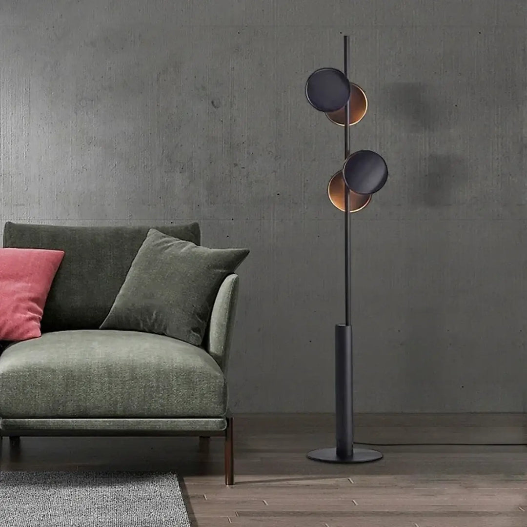 Lampadaire moderne duolia avec double éclairage et silhouette graphique en métal noir mat et cuivre brossé