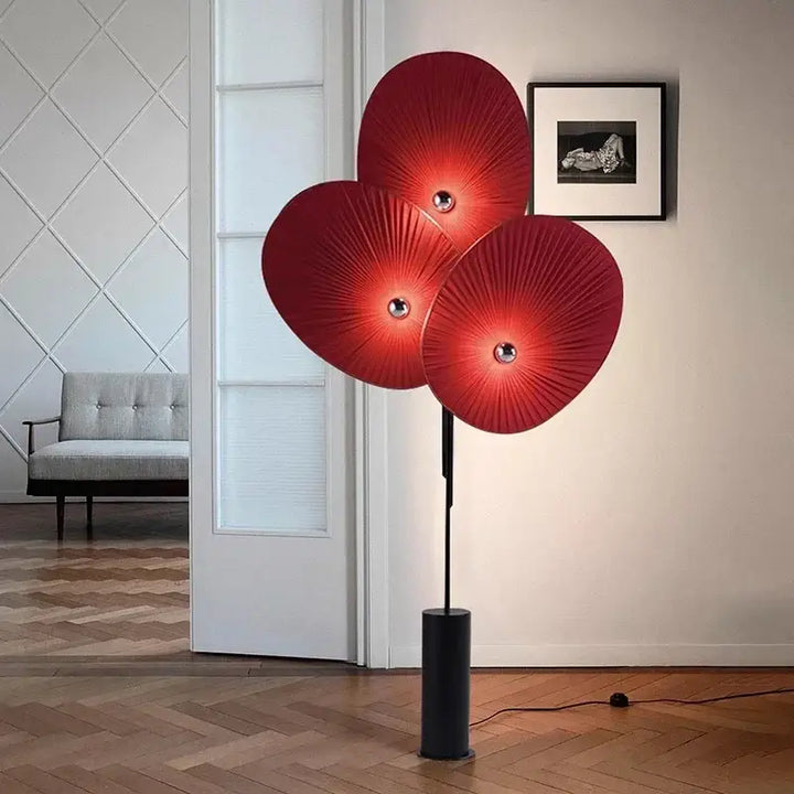 Lampadaire moderne rouge à disques texturés avec détails dorés