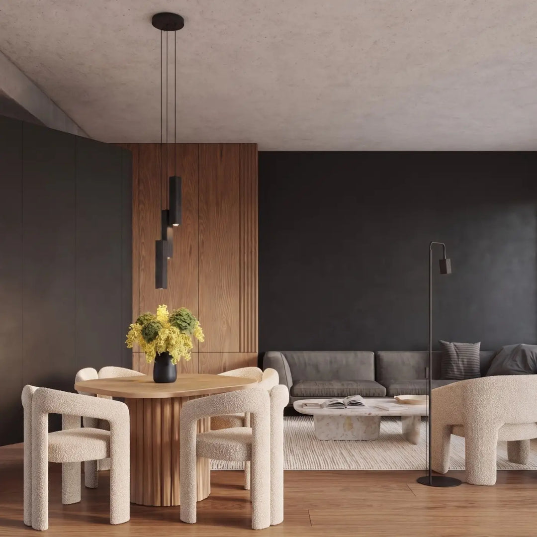 Lampadaire Rayo noir à spot rainuré dans un salon