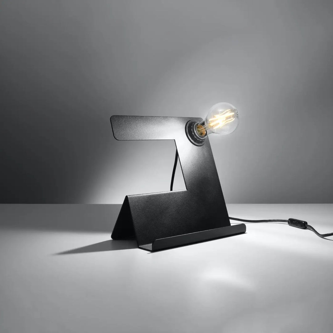 Lampe à poser noir allumée