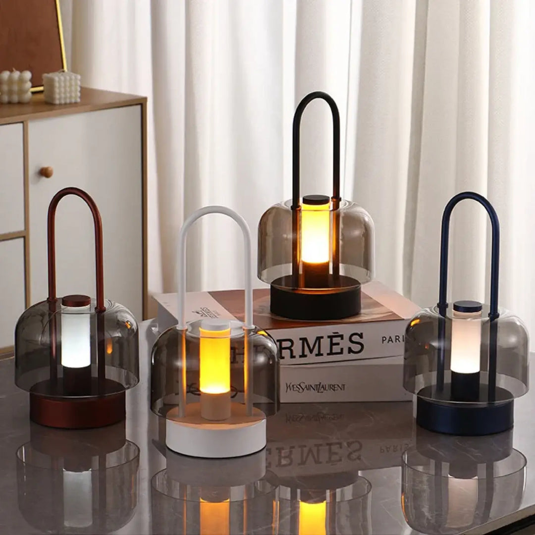 Lampe de table cristo avec anses métalliques courbées et dômes en verre translucide comme veilleuses led chaleureuses