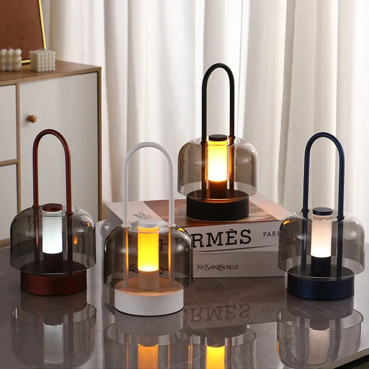 Lampe de table cristo avec anses métalliques courbées et dômes en verre translucide comme veilleuses led chaleureuses