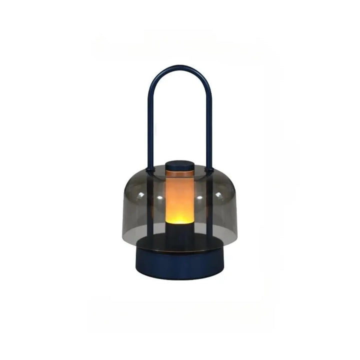 Lampe de table Cristo en bleu marine avec verre fumé et poignée arche diffusant une lumière chaude pour night light