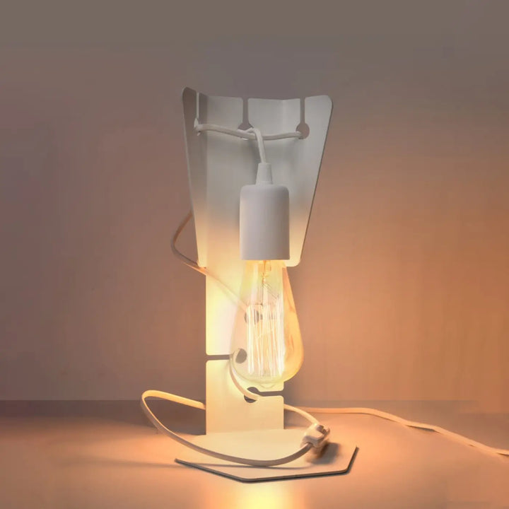 Lampe à poser blanc allumée