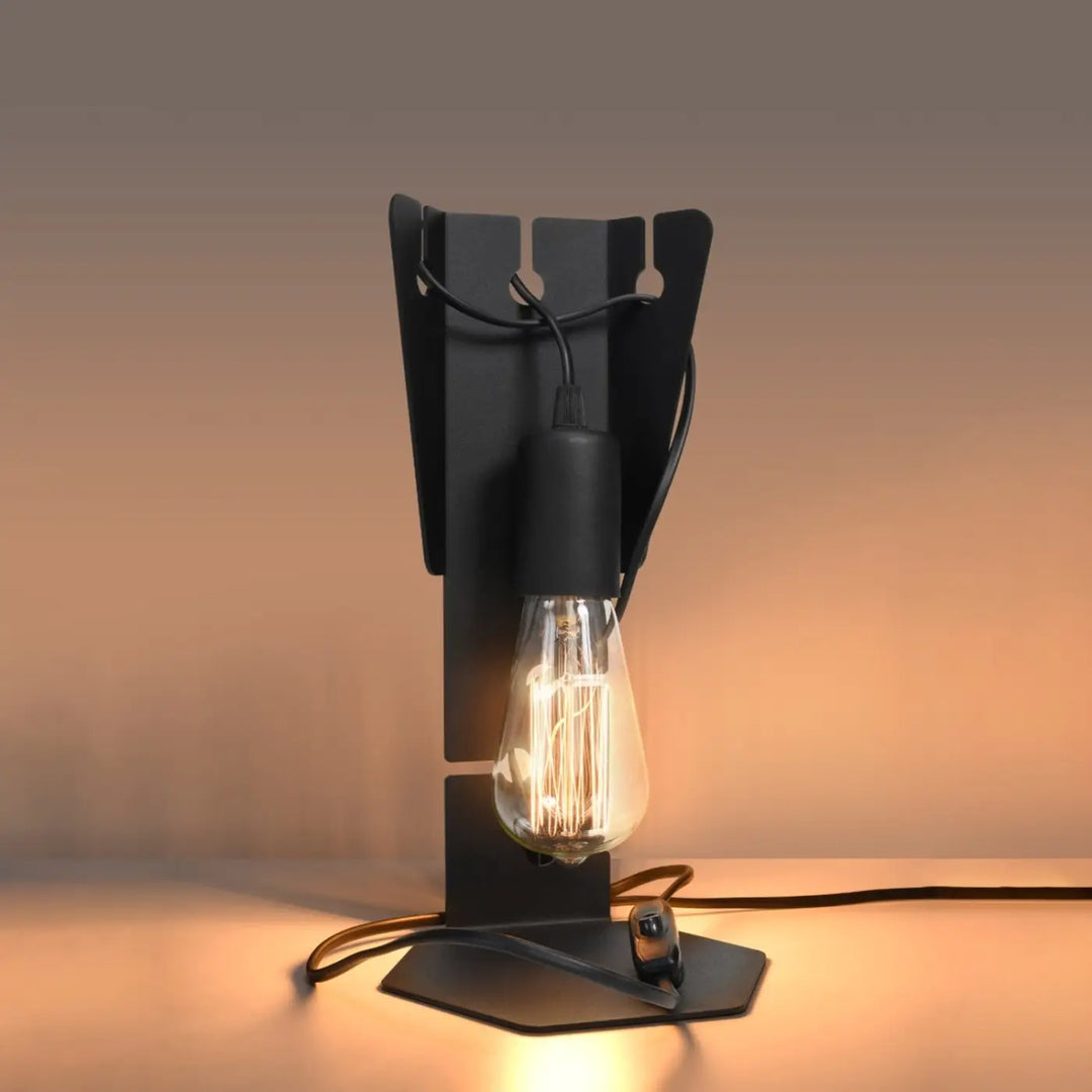 Lampe à poser noir allumée