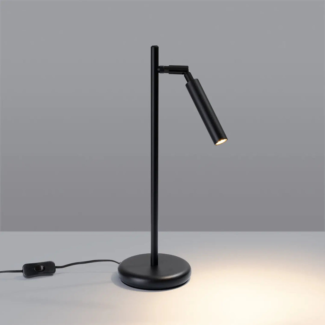 Lampe à poser noir allumée