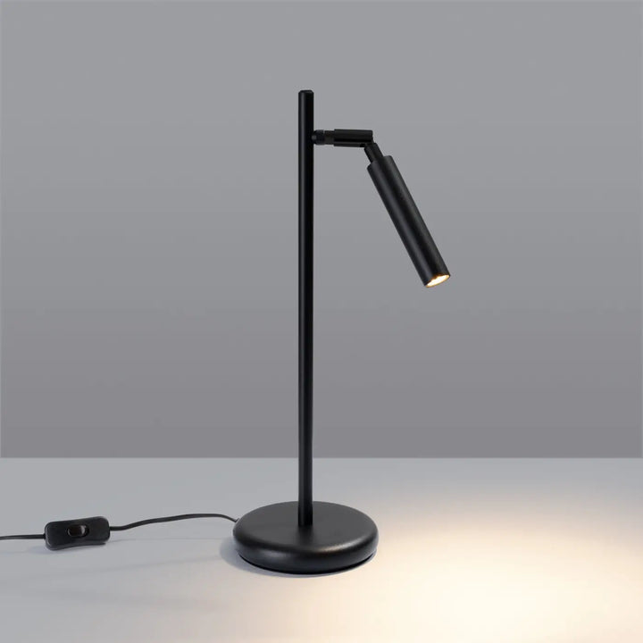 Lampe à poser noir allumée