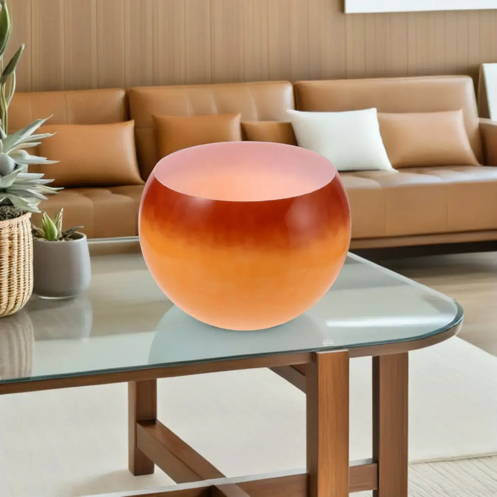 Lampe de chevet mars sphérique en dégradé orange et rose avec finition translucide offrant lumière douce et facilité d’entretien