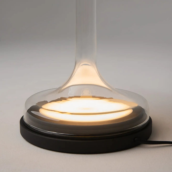 Lampe spirito lampe de chevet avec socle vertical en verre gris et lumière circulaire élégante sur base noire