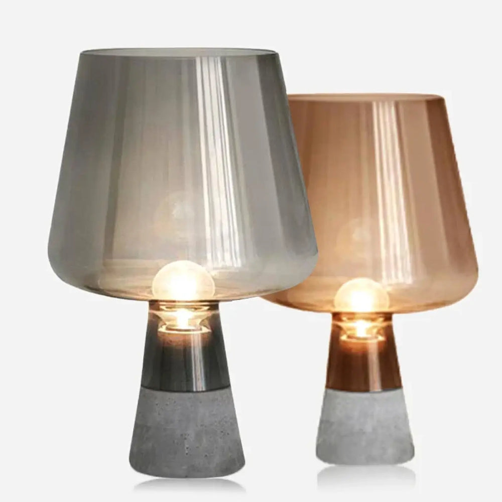 Lampe de chevet moderne avec verre fumé et pied effet béton en ton cuivre sur base effet béton texturé
