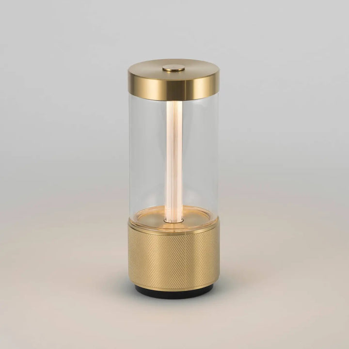 Lampe de chevet Takeout finition laiton, allumée #couleur_dor