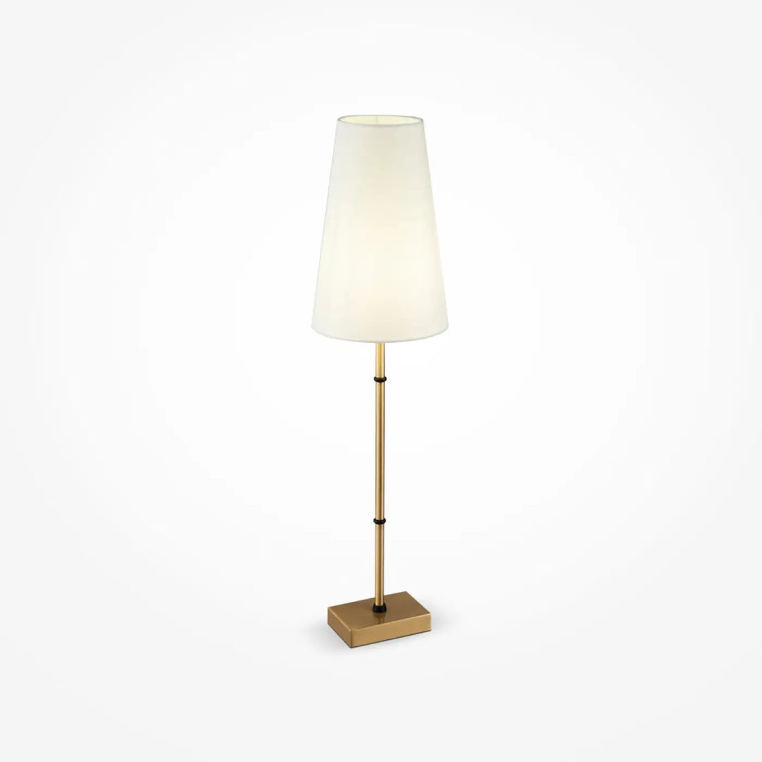 Lampe de chevet zaragoza avec pied doré et abat-jour clair offrant une lumière douce et un design minimaliste