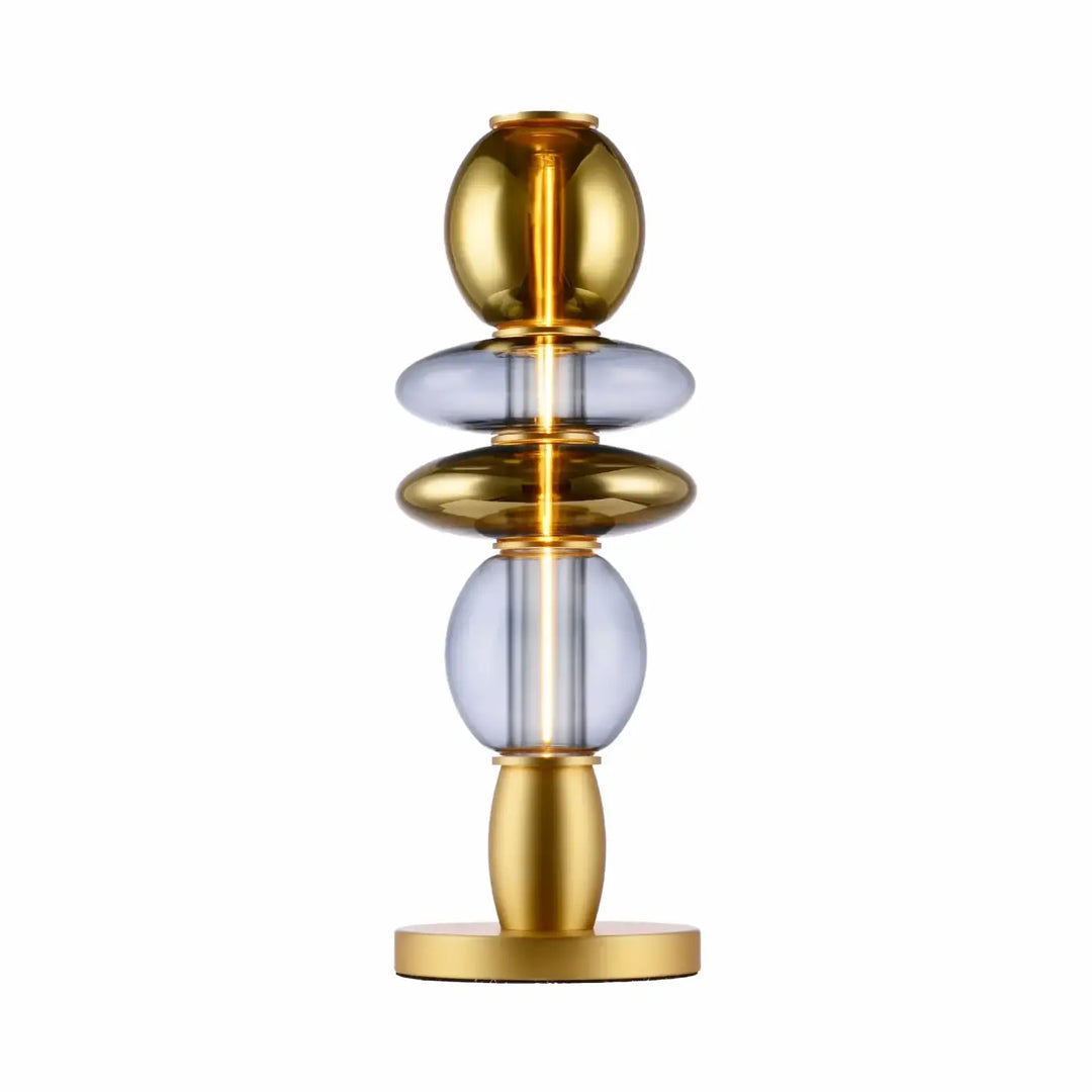 Lampe de chevet léonor avec verre soufflé sphérique empilé et éléments métalliques dorés moderne