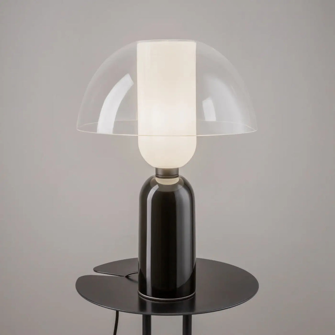 Lampe à poser memory en céramique noire mate avec abat-jour textile translucide et cylindre en verre dépoli éclairé