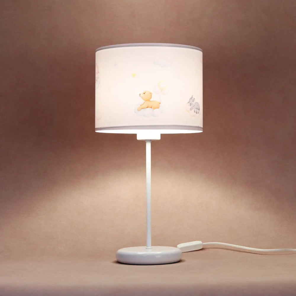 Lampe de table marron clair avec abat-jour cylindrique blanc illustré dourson pleine jaune et éléphant gris