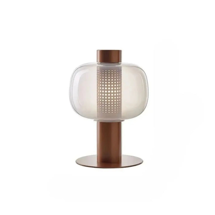 Lampe de table vetra avec abat-jour en verre coloré translucide à perforations circulaires et base métal cuivré design moderne