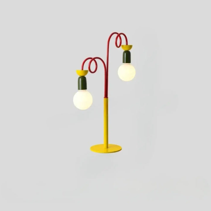 Lampe de table ziggy en métal jaune, rouge et vert avec deux bras courbés et détails rétro, table contemporaine élégante