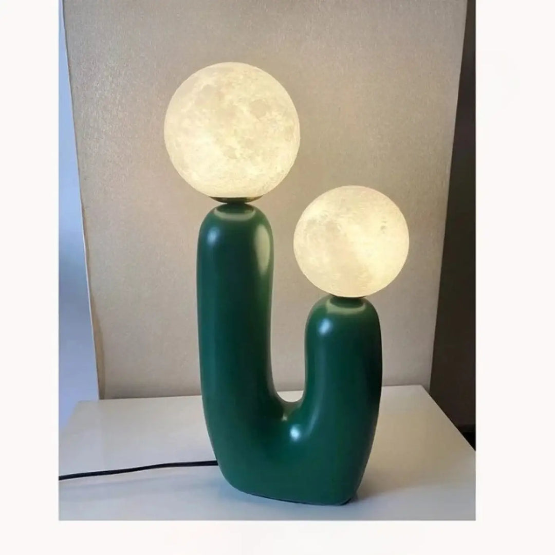Lampe de table tsilo en céramique vert émeraude avec deux ampoules sphériques lune éclairées sont-elles incluses piles sont-elles disponibles