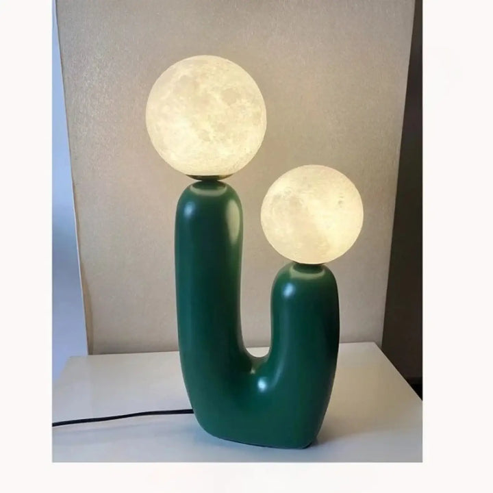 Lampe de table tsilo en céramique vert émeraude avec deux ampoules sphériques lune éclairées sont-elles incluses piles sont-elles disponibles