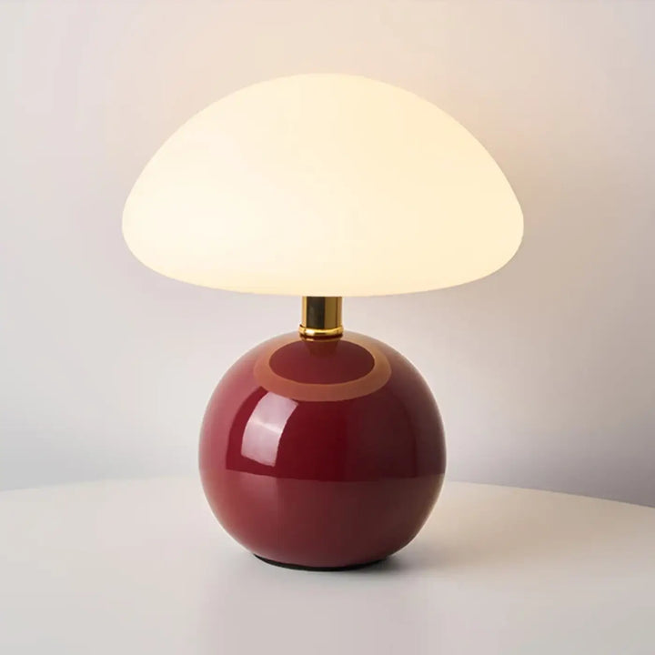 Lampe de table agaris en céramique rouge brillante avec base sphérique et abat-jour design champignon blanc diffus