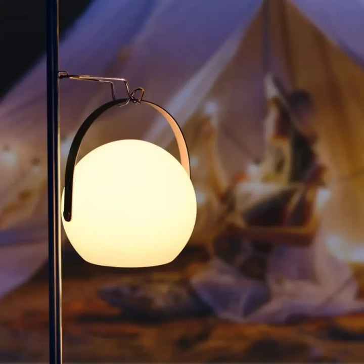 Lampe de table lumina avec poignée noire en métal et lumière chaude pour décoration intérieure moderne
