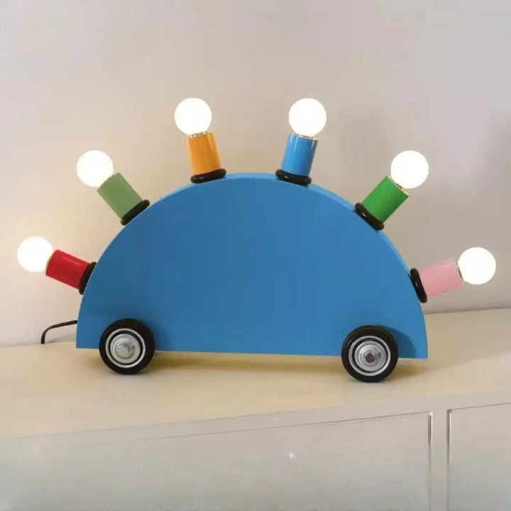 Lampe de table ferra en forme de voiture bleue avec ampoules colorées rouge vert orange et rose idéale pour décoration intérieure et l’atmosphère d’une pièce