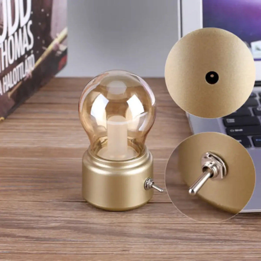 Lampe de table vintage vintora en métal doré avec globe en cloche ambrée claire pour décoration intérieure élégante