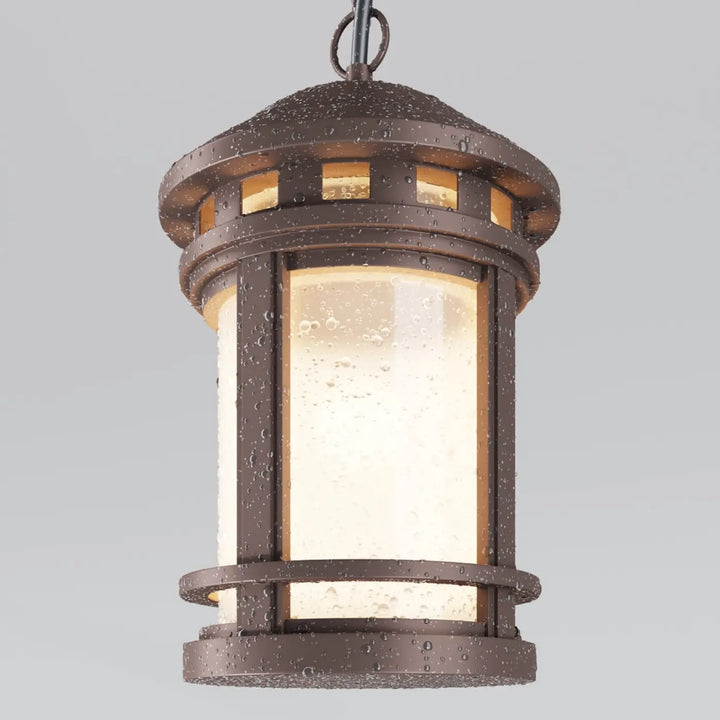 Lanterne suspendue salamanca bronze avec panneaux en verre texturé éclairage chaud pour aux porches