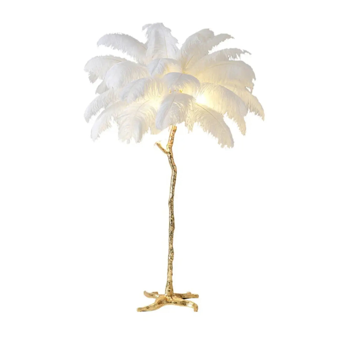 Lampadaire exotis avec plumes blanches et socle doré en forme de luminaire palmier élégant