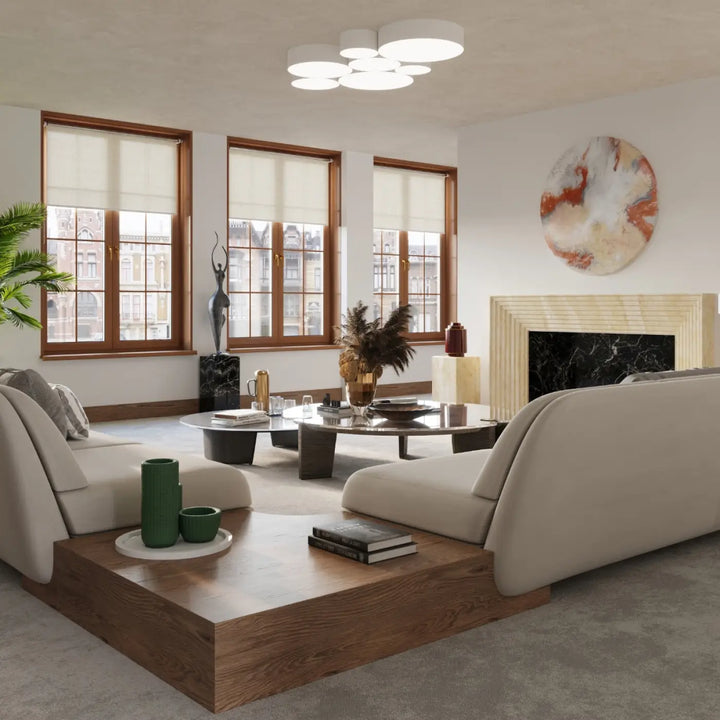 Luminaire plafonnier arena blanc avec éclairage polyvalent et forme riche éclaire un canapé sectionnel beige en tissu