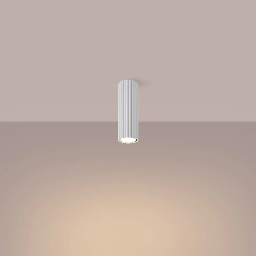 Plafonnier karbon blanc cylindrique avec rainures verticales et ampoules gu10 interchangeables design minimaliste