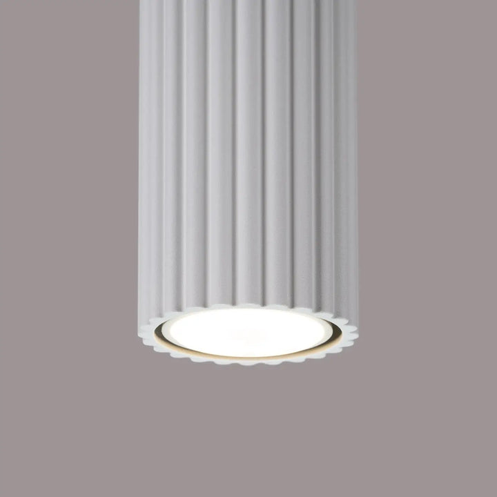 Plafonnier karbon blanc design minimaliste avec corps cylindrique cannelé et ampoules gu10 interchangeables led