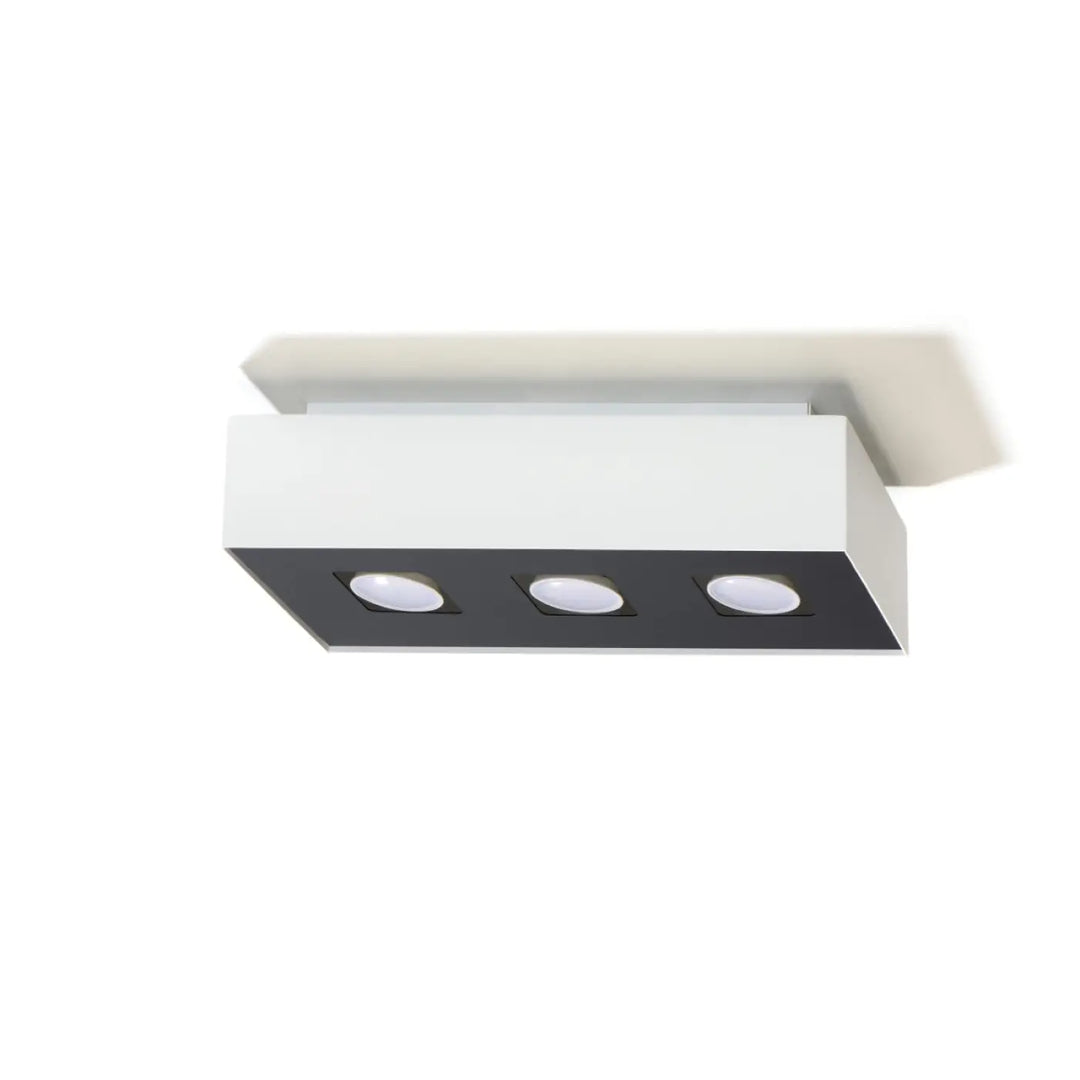 Luminaire plafonnier moderne blanc et noir avec spot allongé et trois sources lumineuses led circulaires