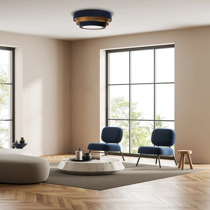 Luminaire plafonnier bleu marine avec anneaux métalliques dorés circulaires design moderne triniti elegant