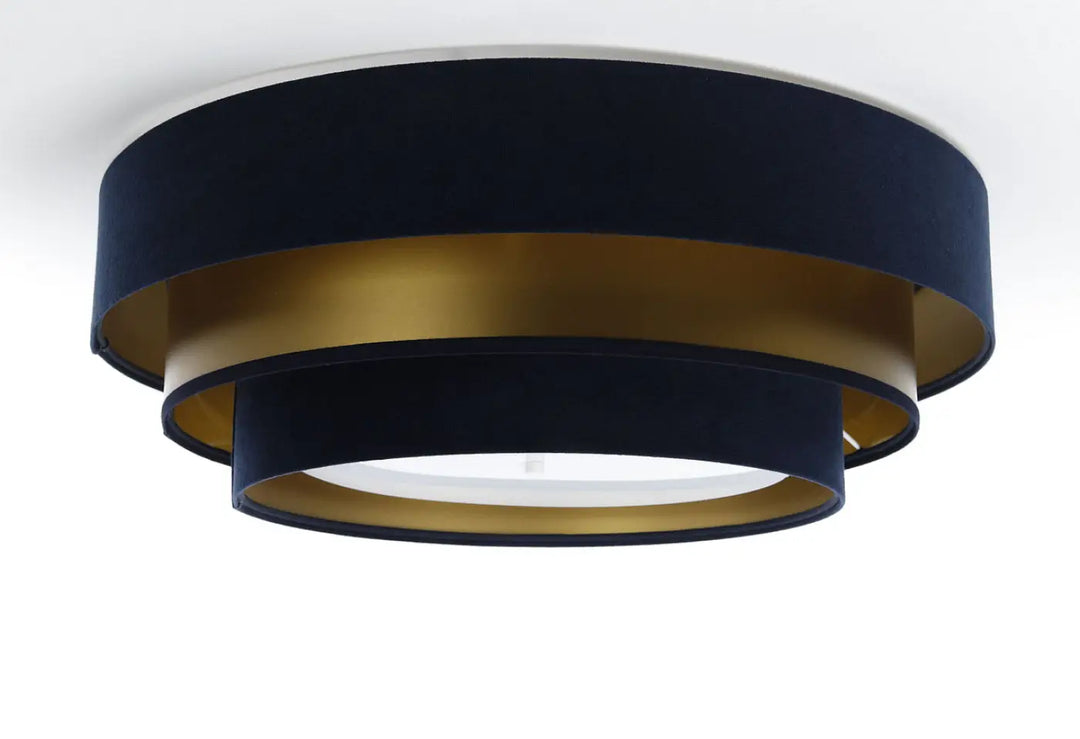 Luminaire plafonnier bleu marine triniti elegant avec anneaux concentriques en velours bleu marine et bord doré métallique
