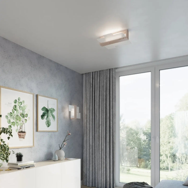 Luminaire plafonnier feniks 2 avec cadre en bois naturel et verre dépoli offrant une atmosphère unique et design intemporel
