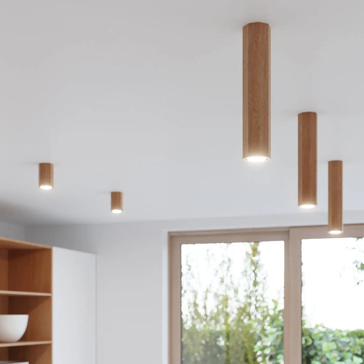 Luminaire plafonnier zeke 6 en bois chêne avec finition naturelle et lumière douce chaude idéale lampe zeke bois s’intégrera parfaitement